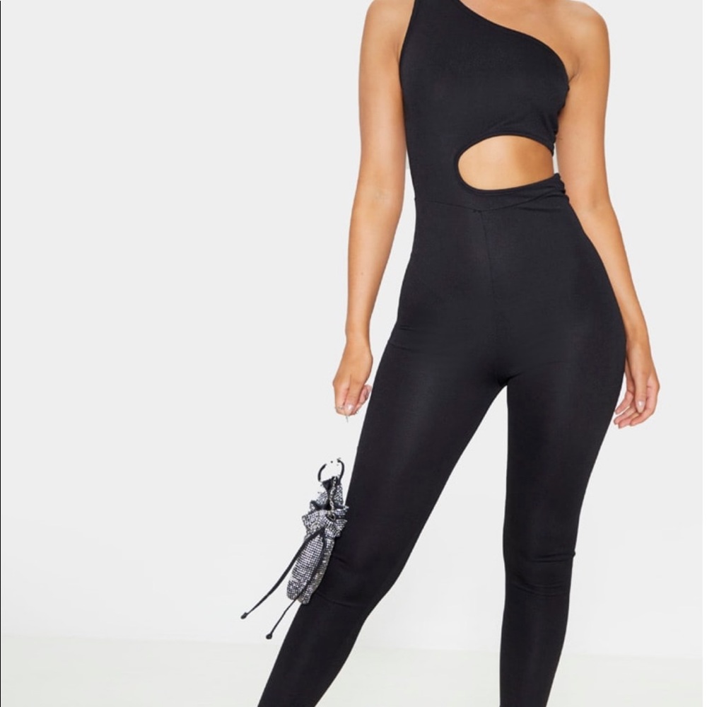 Black one shoulder cut out jumpsuit.